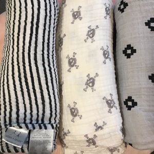 Set of four Aden and Anais muslin swaddles.